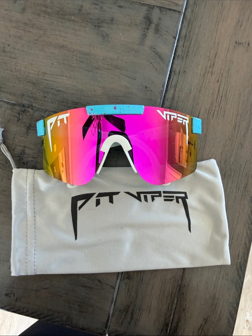 Pit Viper Mirrored Pink Lens Cycling Goggles with Light Blue Frame Accents